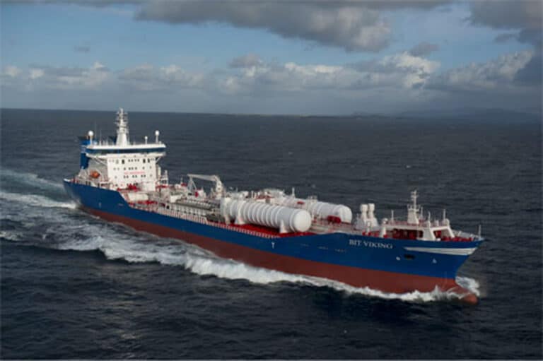 A sideview of a Tarbit maritime vessel sailing calm waters