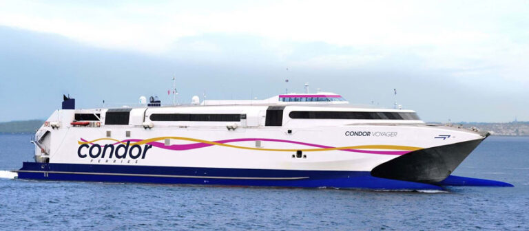 A close-up view from the side of a Condor Ferries passenger ferry