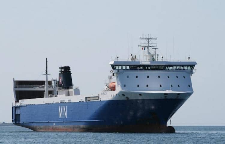 A close-up view of a Compagnie Maritime Nantaise vessel navigating the sea