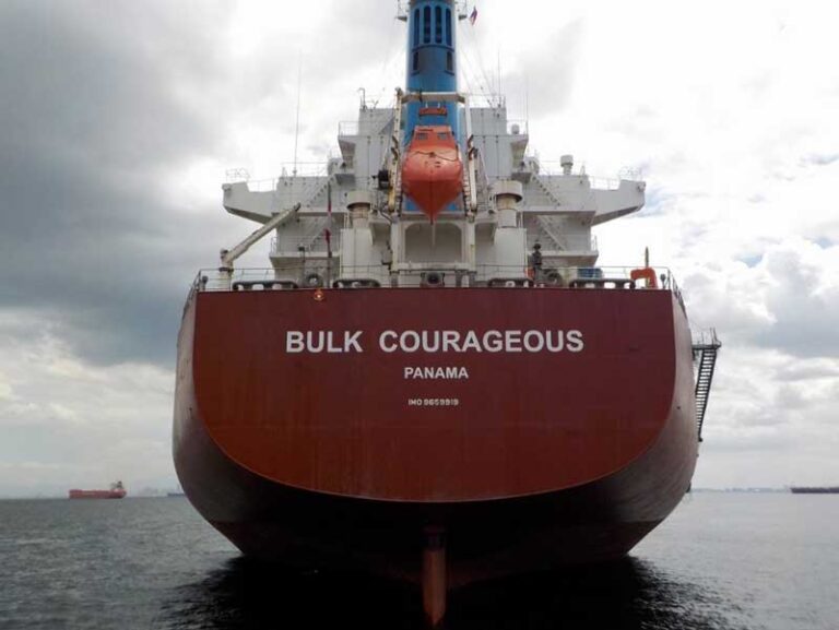 A close-up of the stern of a bulk vessel at sea