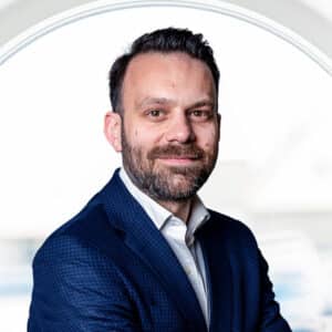 A close-up portrait of SERTICA Business Development Manager for Greece, Dimitris